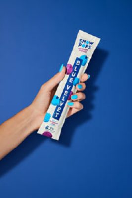 Image of SnowPops Blue Velvet Popsicle in-hand.